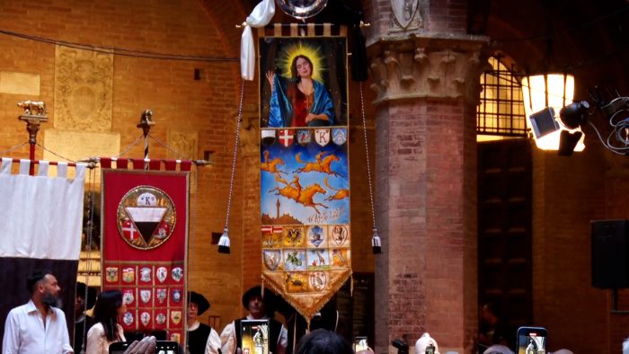 Palio 16 agosto, svelato il Drappellone di Francesco De Grandi